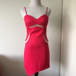 Bebe Cut Out Bodycon Dress in Fushia